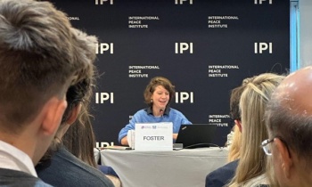 Florence Foster moderating a panel discussion during Geneva Peace Week meets New York
