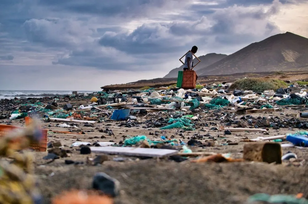 View of a beach covered by plastic garbage on the island of Santa Luzia, Cape Verde